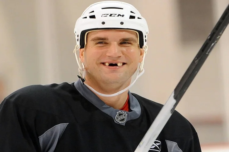 A picture of a hockey player representing sports related dental injuries